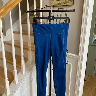 ATHLETA BLUE REFLECTIVE ANKLES BACK ZIP POCKETS RUNNING ATHLETIC LEGGINGS SZ S