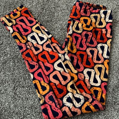 LuLaRoe Leggings OS Navy w/ Pink Coral Yellow and Tan S Shapes Buttery Soft