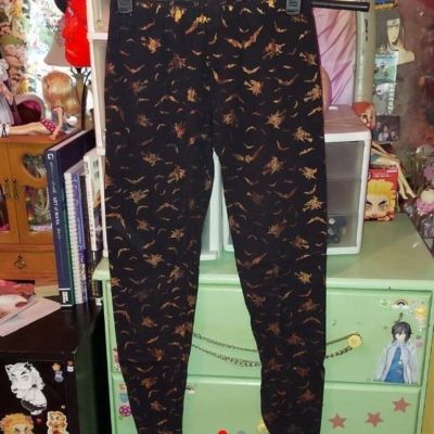 Black leggings with shiny gold glitter bats & witches pattern