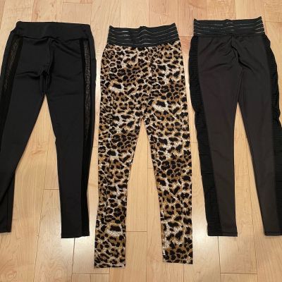 3 Pairs of women’s leggings Mesh and Scrunch Booty Leggings fits like Size 6-8